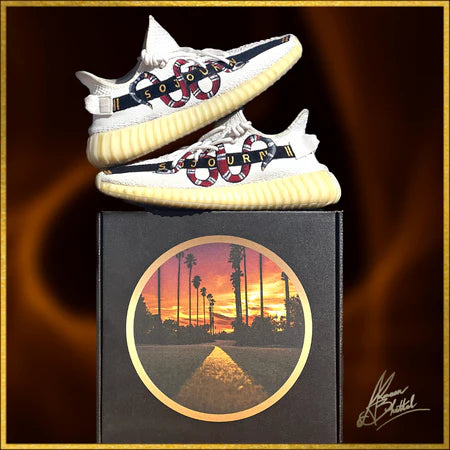 Hand-painted Yeezys with a desert sunset design